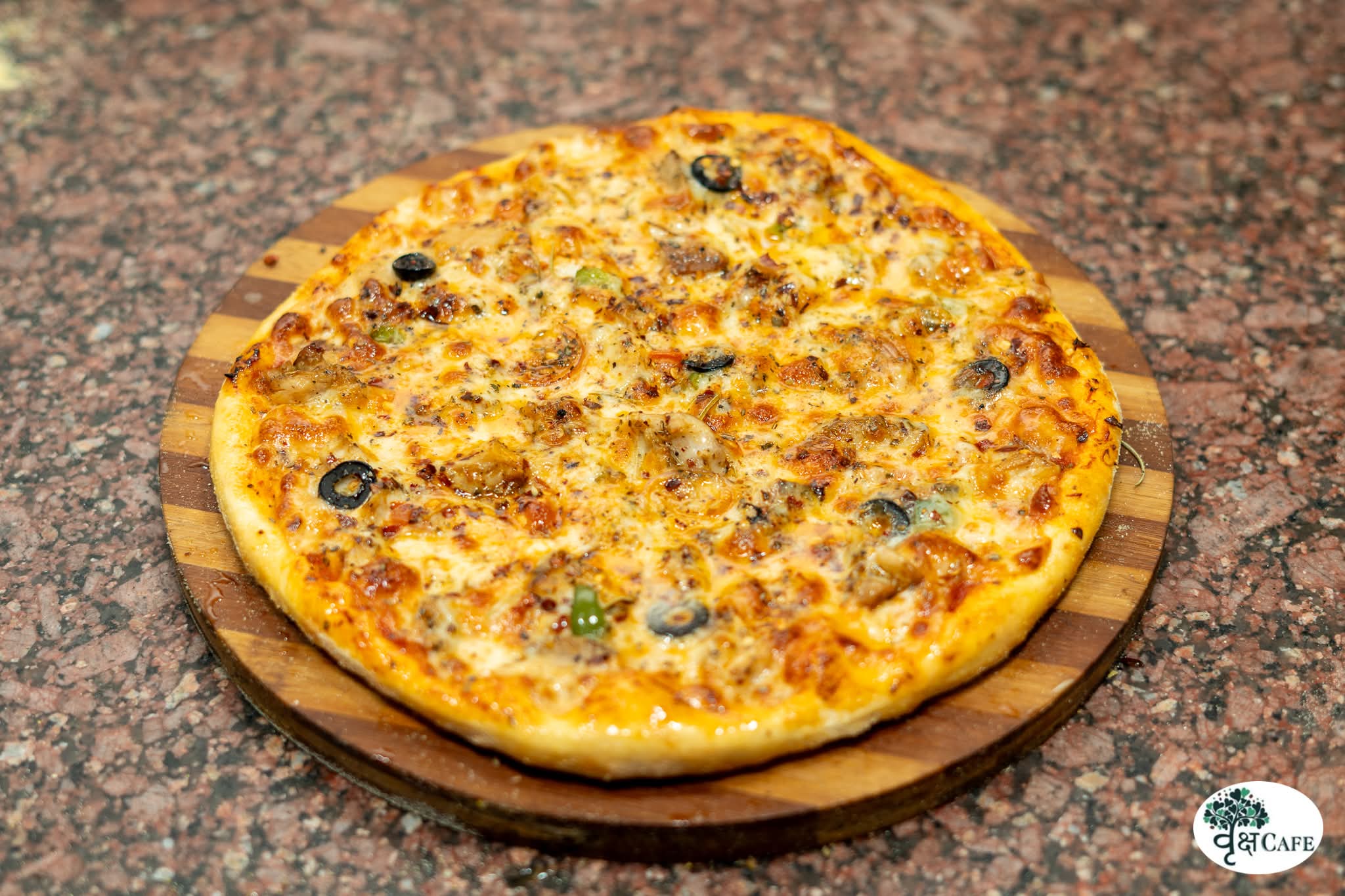 Wood-fired pizza — Brikshya Cafe Birtamode